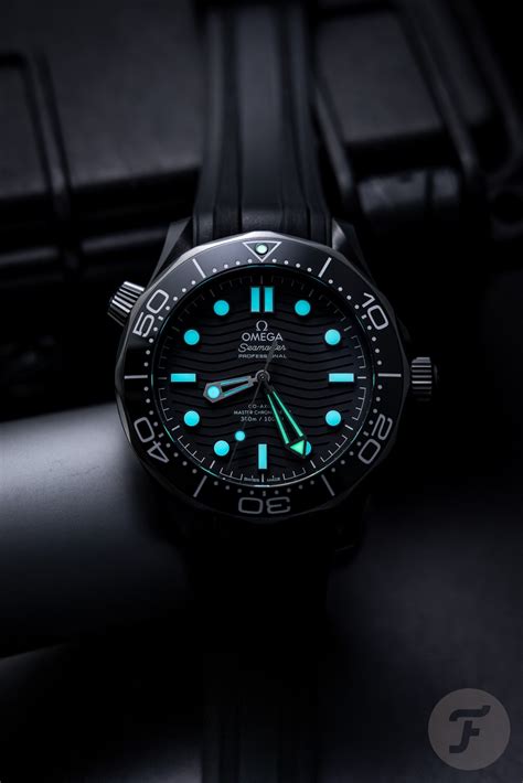 omega black black seamaster lume